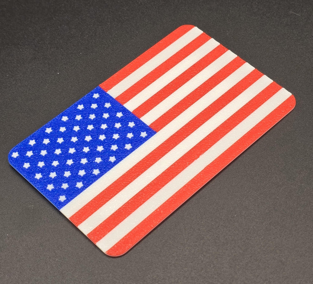 Patriotic American flag cut card placed with a deck of playing cards