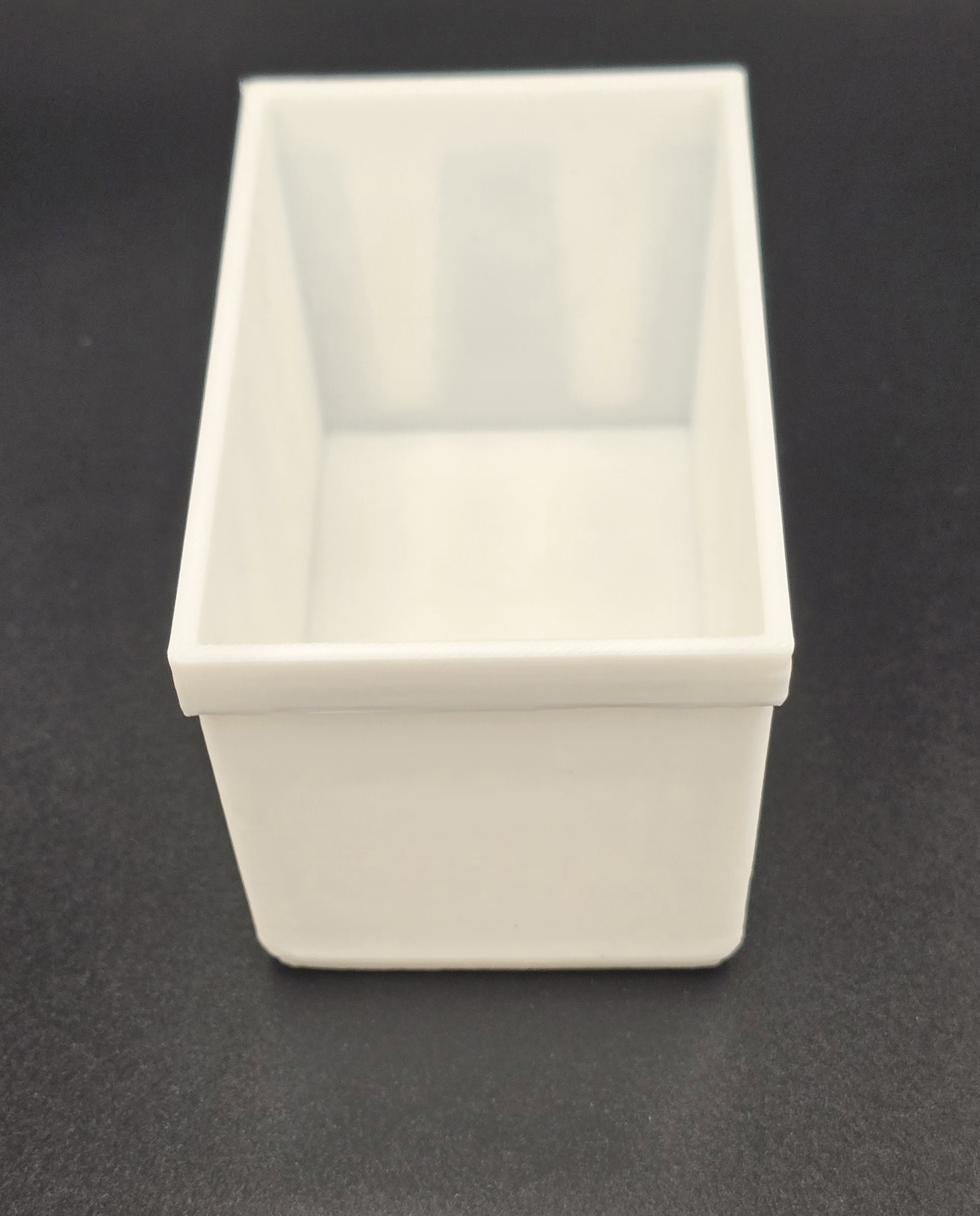 White 3D printed mini tote storage bin, empty, angled view