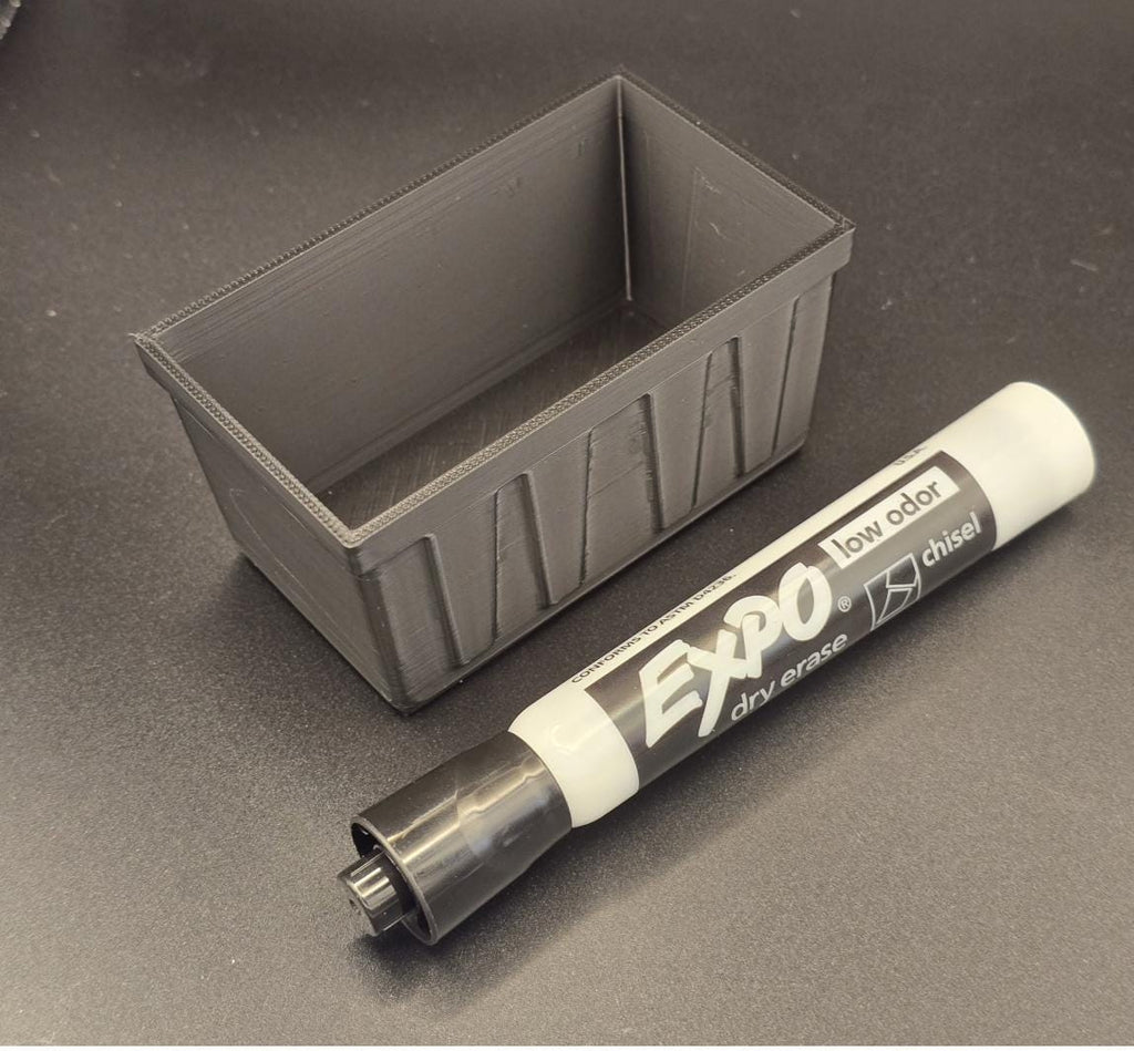 Black 3D printed mini tote bin with dry erase marker for scale, no lid