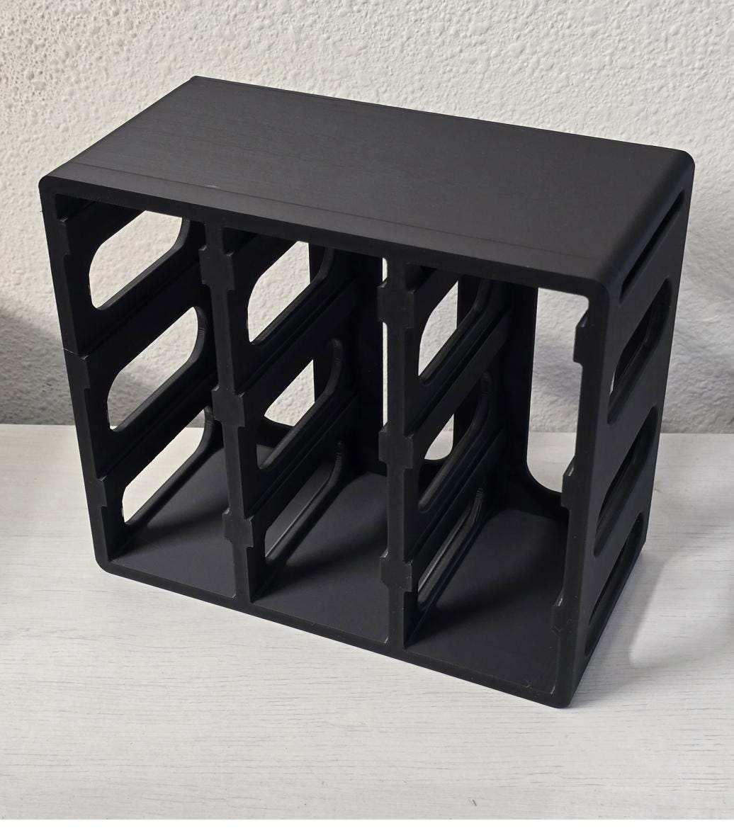 Black 3D printed mini tote mounting rack frame, empty, angled view