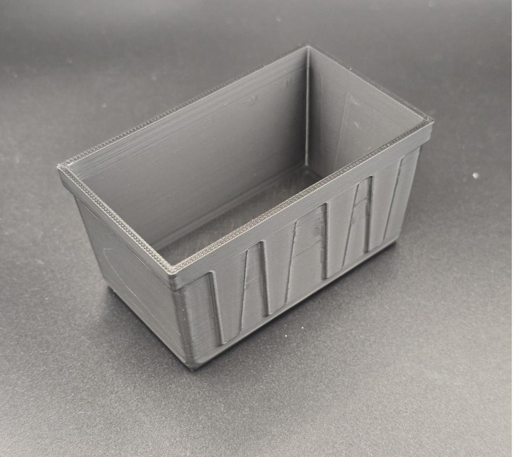 Black 3D printed mini tote storage bin, empty, angled view